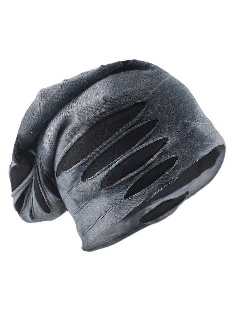 Fashionable men's beanie with ripped holes and geometric pattern, perfect for casual wear and cold weather. Made of durable polyester.